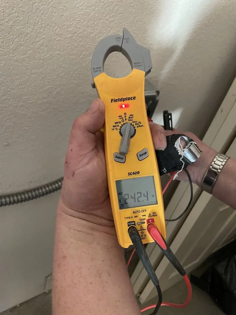 Voltage testing with clamp meter during Whole House Surge Protector in Paintsville
